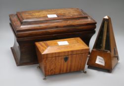 Two Victorian tea caddies, one rosewood and one satinwood, together with a Victorian metronome