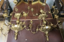 A pair of 18th century style nine branch gilt wall lights length 68cm