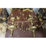 A pair of 18th century style nine branch gilt wall lights length 68cm