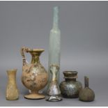 A group of Roman and ancient glass vessels tallest 12cm