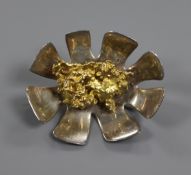 A white metal mounted yellow metal "nugget" flower head brooch, 48mm.