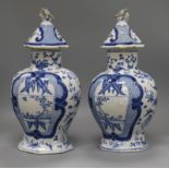 A pair of 19th century Chinese blue and white vases height 38cm