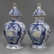 A pair of 19th century Chinese blue and white vases height 38cm