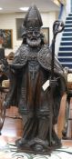 A Spanish carved wood figure of a saint, 19th century, height 98cm