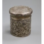 An Edwardian repousse silver cylindrical box and cover, Birmingham, 1901, 83mm.