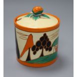 A Clarice Cliff Orange Trees and House preserve jar and cover height 11.5cm