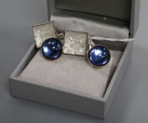 A pair of Lalique 'Arethuse' silver and crystal cufflinks and a pair of blue cabochon and gilt