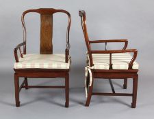 A pair of Chinese hardwood armchairs