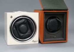 A Rapport Automatic mains-operated watch winder and an Underwood battery-operated leather-clad