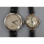 A lady's 1930's 9ct gold Rolex manual wind wrist watch and a gentleman's silver wrist watch.