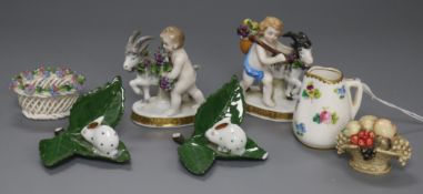 A Royal Doulton miniature jug, a pair of models of amorini with goats and sundry small items