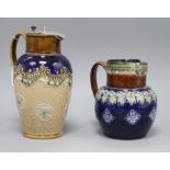 Two Royal Doulton Lambeth stoneware jugs, one with hallmarked silver cover tallest 23cm