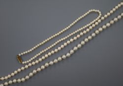 A cultured pearl drop, a cultured pearl necklace and two other necklaces.