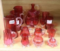 A collection of eighteen pieces of Victorian cranberry, glassware, together with a painted three