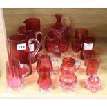 A collection of eighteen pieces of Victorian cranberry, glassware, together with a painted three