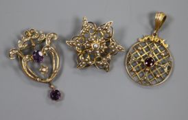Three assorted early 20th century 9ct gold and gem set pendants.