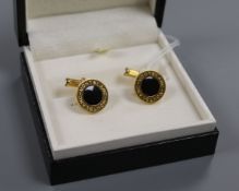 A pair of Montblanc Meisterstuck black onyx and gilt cufflinks, boxed.