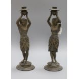 A pair of Egyptian spelter candlesticks height 38.5cm