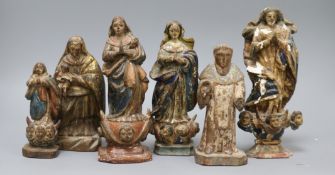 A collection of six 18th / 19th century South American polychrome painted figures of the Virgin Mary