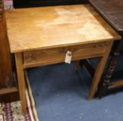 A Spanish pine side table W.66cm