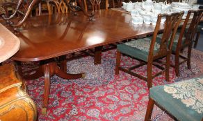 A Regency style mahogany two pillar extending dining table, the top 10ft x 4ft 6in, fully extended