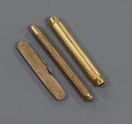 A 9ct gold mounted penknife, a 9ct gold pencil and an 18ct gold pencil.