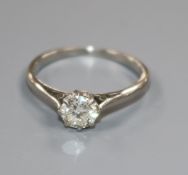 A platinum and solitaire diamond ring, the stone weighing approximately 0.50cm size K.