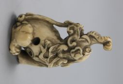 An early 20th century Japanese ivory netsuke of a Baku