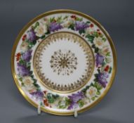 A Sevres saucer decorated with a garland of flowers, dated 1815 diameter 15cm