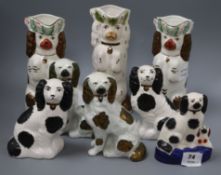 Eight various modern Staffordshire pottery dogs, including three 'dog' jugs tallest 26cm