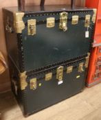 Two metal bound leather travelling trunks W.92cm