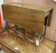 A small George III style mahogany 'spider leg' table W.61cm