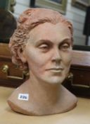 A terracotta head of a woman, signed Nilli Soukop 1943-44 height 31.5cm