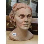 A terracotta head of a woman, signed Nilli Soukop 1943-44 height 31.5cm