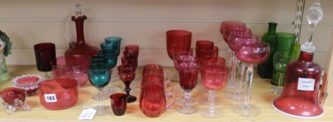 A twenty eight piece collection of Victorian and later cranberry glassware and five green bowled