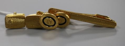 Two pairs of Dunhill engine-turned gold-plated cufflinks and a matching tie clip