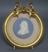 A Sevres blue ground biscuit medallion of Louis XVI diameter 8cm