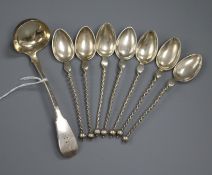 Seven 800 continental white metal spoons and a William IV Scottish silver toddy ladle, Edinburgh,