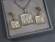 A Lalique 'Arethuse' swivel-mounted crystal pendant and pair of matching earrings (boxed).