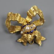 A Victorian yellow metal, diamond, pearl and enamel ribbon bow pendant brooch, 42mm.