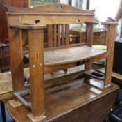 An Arts and Crafts hall seat W.111cm