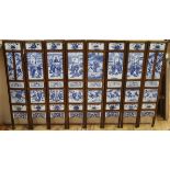 A 19th century Chinese blue and white porcelain panelled screen length 136cm