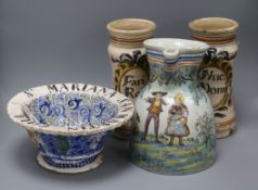 A pair of majolica albarelli, a faience jug and a footed bowl, the albarelli marked 'Fari Reso'
