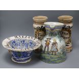 A pair of majolica albarelli, a faience jug and a footed bowl, the albarelli marked 'Fari Reso'