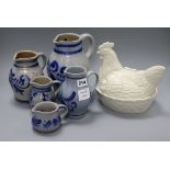 Five graduated Rheinish stoneware jugs and a hen on nest egg tureen and cover tallest 22cm