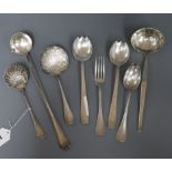 A French silver sifter spoon with scallop shaped bowl and eight pieces of plated French cutlery (9)