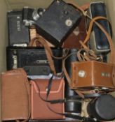 A quantity of cameras and camera equipment