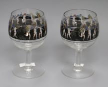 A pair of Vetri Della Arte goblets, enamelled with a frieze of putti height 19.5cm