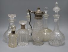 Six decanters and a claret jug tallest 30.5cm