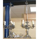 A pair of three branch putti table lamps height 71cm